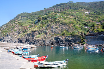 Fototapeta na wymiar The port of Monterosso, Italy with boats and the mountain
