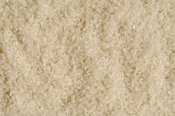 Egyptian rice background. Top view. Food background. White rice grains texture