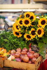 Sunflowers and onion on the old fashioned sunday provencal market in Aix-en-Provence, Provence,...