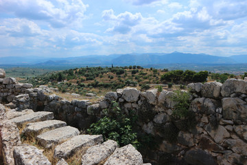 Fototapeta na wymiar Ancient stones ruins of famous bronze age city Mycenae Peloponnese Greece