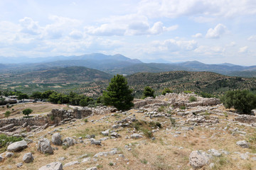Slope of the hill with stones of ancient greek city Mycenae ruins Peloponnese