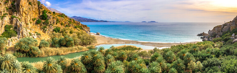 Panorama of Preveli beach at Libyan sea, river and palm forest, southern Crete , Greece