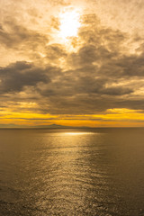 Sunset sky over calm sea in the evening