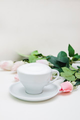 Delicious coffee cappuccino with pink flowers