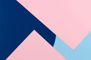 Abstract colored paper texture background. Minimal geometric shapes and lines in pastel blue, light pink and navy colours