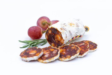 Chorizo. Traditional Spanish salami with paprika. White background. The isolated image.