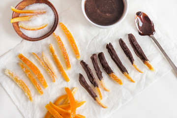 Candied orange peel in chocolate or sugar is a favorite Christmas treat for children and adults