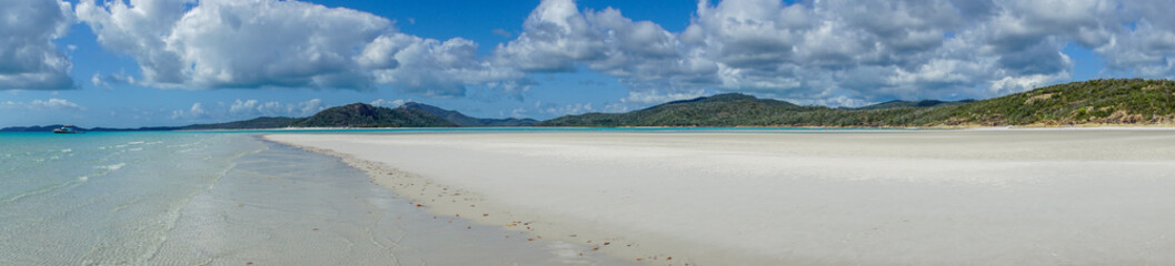 the white beach of the Whitsunday Islands in Australia, which consists of 99 percent quartz sand, and the azure blue sea