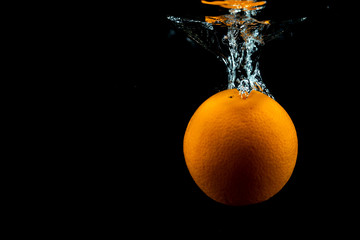 fresh orange in the water
