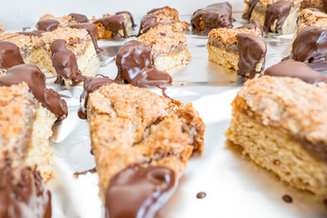 Nut corners on aluminum foil with chocolate glaze