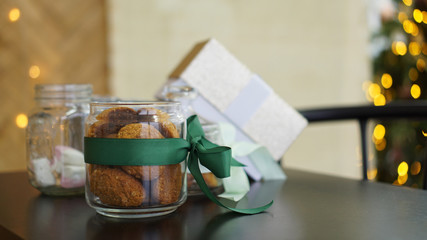 Healthy cookies with dried fruits and nuts in a glass jar. Christmas time