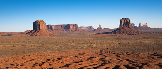 Monument Valley region of the Colorado Plateau with vast sandstone buttes on the Arizona–Utah border, in a Navajo Nation Reservation. USA