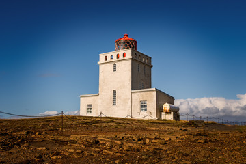 Fototapeta na wymiar lighthouse at Dyrholaey in Iceland. September 2019