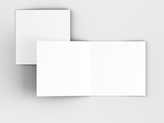 Brochure in square format folded to two - mockup. 3d illustration