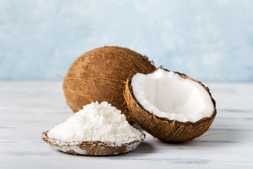 Health content, coconut coconut half, coconut flour, in plate, light background