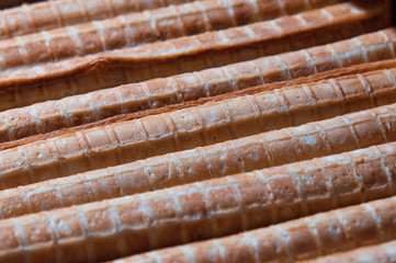 wafer rolls with boiled condensed milk. sweet dessert.
