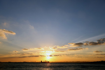 Obraz premium Sunset view of marmara sea and cargo ship
