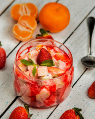 fruit salad in the glass on the table