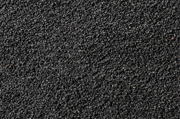 Fototapeta premium heap of black cumin seeds texture background , Nigella Sativa, Organic herbal medicine for many diseases