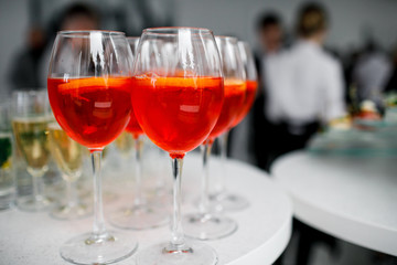 orange aperol in glasses at a banquet