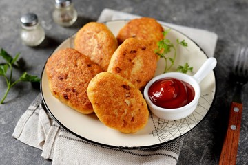 Chicken cutlets with onions and tomato sauce. Homemade food.