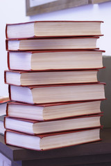 A large stack of books