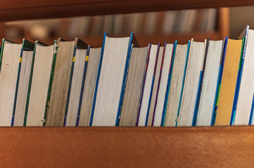 old books on a shelf in the library
