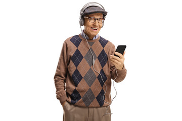 Senior man listening to music on headphone from a mobile phone