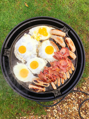 Eggs Bacon and Sausages on BBQ
