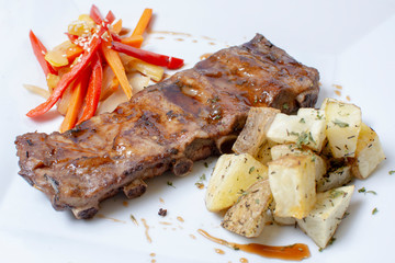  caramelized baked rib, potatoes and salad