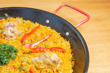  Traditional Spanish paella with different meat, seafood and vegetable ingredients