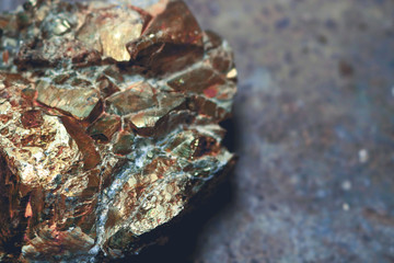 rough colorful mineral with metallic golden glitter - beautiful pyrite ore piece extraterrestrial...