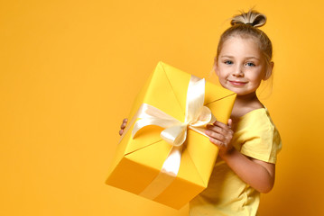 happy child girl with gift box