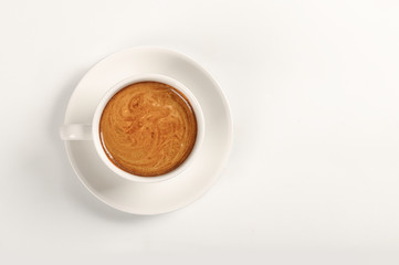 Top view ,Hot coffee  in white cup on white background.