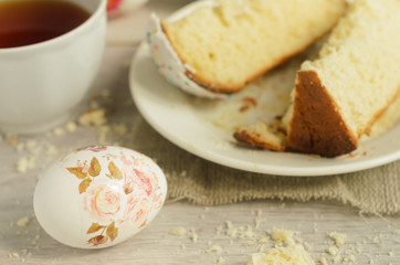 Holiday of Easter.One painted egg on easter breakfast background.Rustic Style.