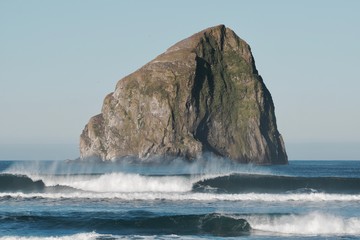 A perfect wave crashing in front of Cape Kiwanda on the Oregon Coast