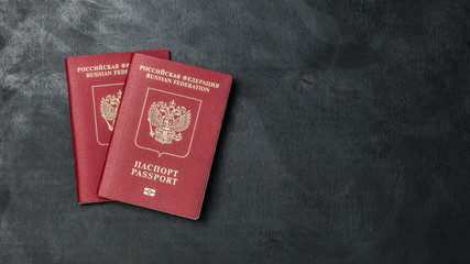 two Russian passports on a black background copy space