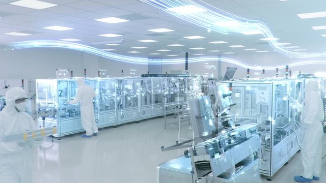 Manufacturing Facility Workers Assembling Products Using Industrial High Precision Machinery. Special Effects Animation: Digitalization of Factory