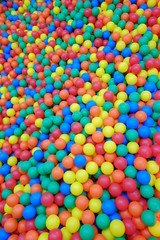 Fototapeta na wymiar Colorful kids ball pit or ball pool playground for children