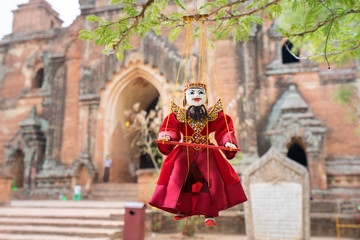 Traditional Burmese puppets sold at one corner inside the ancient Dhammayangyi temple, Bagan Myanmar