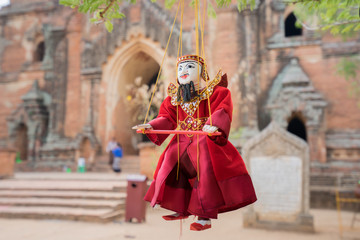 Fototapeta na wymiar Traditional Burmese puppets sold at one corner inside the ancient Dhammayangyi temple, Bagan Myanmar