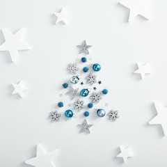 Silhouette of christmas tree from xmas decoration with white star