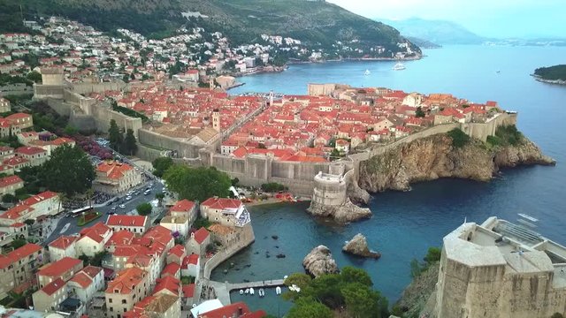 The aerial view of the Walls of Dubrovnik, the famous medieval city with Pila Gate, The Minceta Tower, main street - Stradun, harbor, Fort Bokar and St. Lawrence Fortress