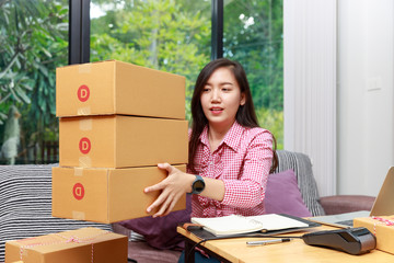 Seller prepare to send goods to customer after checking order.
