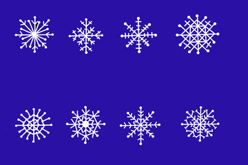 Snowflakes drawing on blue background