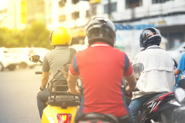 Motorcycles with helmets waiting green traffic light in transportaion safe concept