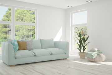 Stylish room in white color with sofa and summer landscape in window. Scandinavian interior design. 3D illustration