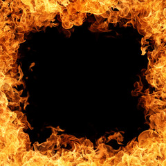 A fire frame of burning flame on dark background for abstract graphic design purpose with copy space