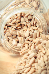 Sunflower seeds with glass jar. Healthy eating
