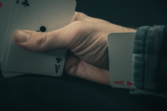 Cheating at card games with an ace up the sleeve 